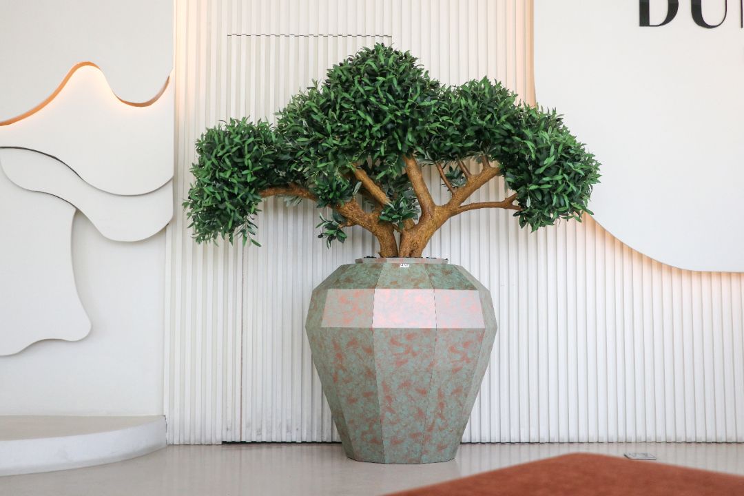 Copper olive tree in a private majlis